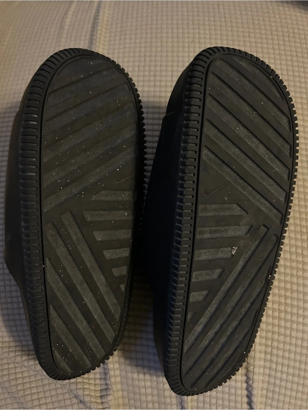 Gently used Nike Black Men's Slide Sandals with Subtle Swoosh